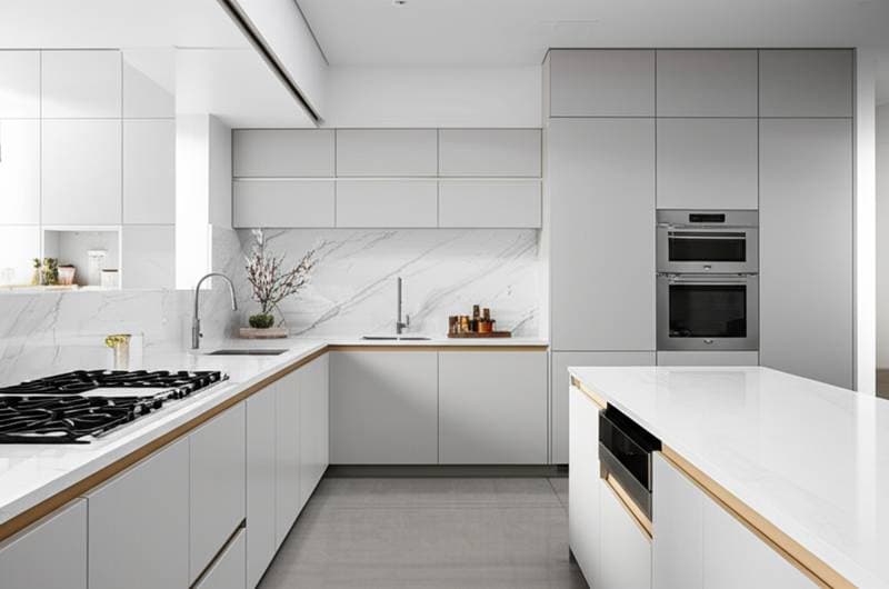 Featured image for Hidden Cabinets Create Seamless Minimalist Kitchens
